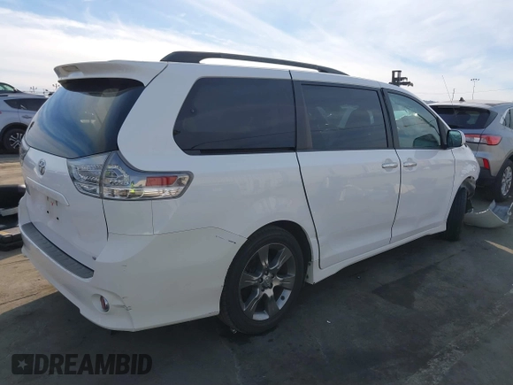 2014 Toyota Sienna SE with VIN 5TDXK3DC2ES472249, listed as a IAAI auction lot 41402101 with Not Provided miles and . Bid and sale history available at DreamBid. Image 4.