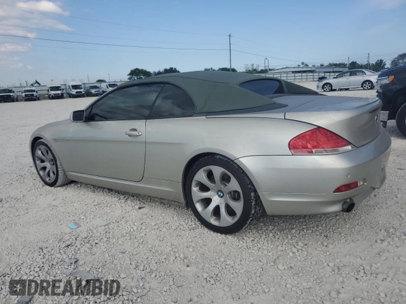 2006 BMW 6 Series 650Ci z VIN WBAEK13406CN72369, wystawiony jako Copart lot #47076175 z przebiegiem 97 684 mil mil oraz Czysty tytuł • Clean title. Historia ofert i sprzedaży dostępna na DreamBid. Obrazek 2.