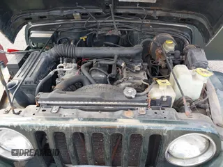1998 Jeep Wrangler Sahara z VIN 1J4FY49SXWP716218, wystawiony jako IAAI lot #42354433 z przebiegiem 234 378 mil mil oraz . Historia ofert i sprzedaży dostępna na DreamBid. Obrazek 10.