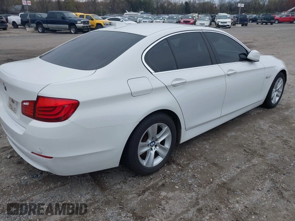 2013 BMW 5 Series 528i xDrive with VIN WBAXH5C5XDD106981, listed as a IAAI auction lot 42012477 with 140,259 mi miles. Bid and sale history available at carsss.com. Image 4.
