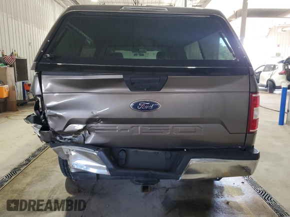 2018 Ford F-150 XL with VIN 1FTMF1EB4JKC19744, listed as a Copart auction lot 57333825 with 81,550 mi miles and Salvage title. Bid and sale history available at DreamBid. Image 6.