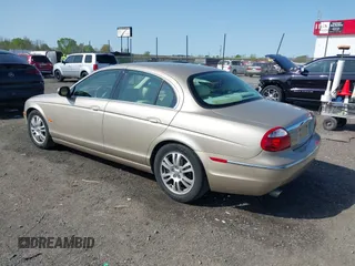 2005 Jaguar S-Type with VIN SAJWA01T95FN22745, listed as a IAAI auction lot 41898269 with 57,614 mi miles and . Bid and sale history available at DreamBid. Image 3.