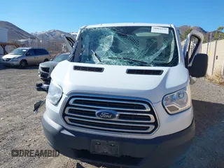 2016 Ford Transit Cargo with VIN 1FTYR1ZM9GKB20351, listed as a IAAI auction lot 38864121 with 99,365 mi miles and . Bid and sale history available at DreamBid. Image 12.