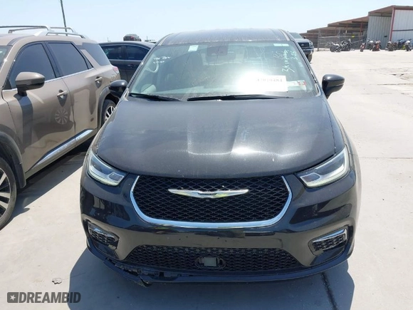 2023 Chrysler Pacifica Hybrid Touring L with VIN 2C4RC1L77PR540958, listed as a IAAI auction lot 42010484 with 61,166 mi miles. Bid and sale history available at carsss.com. Image 12.
