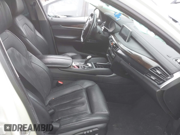 2015 BMW X6 xDrive35i with VIN 5UXKU2C57F0N77194, listed as a IAAI auction lot 41818860 with 105,579 mi miles and . Bid and sale history available at DreamBid. Image 5.