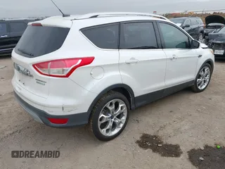 2015 Ford Escape Titanium with VIN 1FMCU0J98FUC07537, listed as a IAAI auction lot 41440462 with 233,924 mi miles. Bid and sale history available at carsss.com. Image 4.