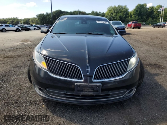 2013 Lincoln MKS z VIN 1LNHL9EK2DG615733, wystawiony jako Copart lot #68223794 z przebiegiem 402 495 mil mil oraz Szkoda całkowita • Salvage title. Historia ofert i sprzedaży dostępna na DreamBid. Obrazek 5.