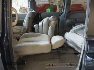 2007 Kia Sedona EX with VIN KNDMB233276179145, listed as a IAAI auction lot 41862424 with 116,525 mi miles. Bid and sale history available at carsss.com. Image 8.