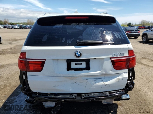 2012 BMW X5 35i z VIN 5UXZV4C59CL759335, wystawiony jako Copart lot #57055065 z przebiegiem 180 589 mil mil oraz Czysty tytuł • Clean title. Historia ofert i sprzedaży dostępna na DreamBid. Obrazek 6.