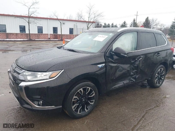 2018 Mitsubishi Outlander PHEV SEL with VIN JA4J24A51JZ026128, listed as a IAAI auction lot 41362805 with 76341 miles. Bid and sale history available at carsss.com. Image 2.