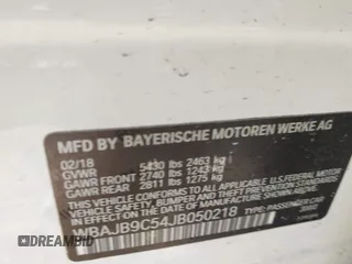 2018 BMW 5 Series M550i xDrive with VIN WBAJB9C54JB050218, listed as a IAAI auction lot 41132695 with 69,659 mi miles. Bid and sale history available at carsss.com. Image 9.