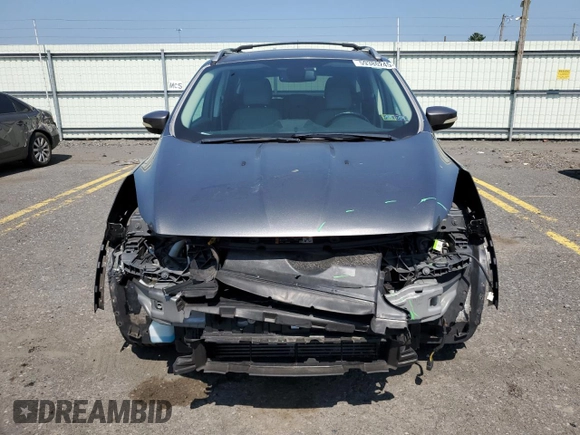 2014 Ford Escape Titanium с VIN 1FMCU0J96EUD41199, выставлен на аукционе Copart как лот 59380245 с пробегом 100 319 миль миль и Списание • Salvage title. История ставок и продаж доступна на DreamBid. Изображение 5.