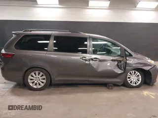 2015 Toyota Sienna XLE with VIN 5TDYK3DC3FS677780, listed as a IAAI auction lot 42155459 with 102,355 mi miles. Bid and sale history available at carsss.com. Image 13.