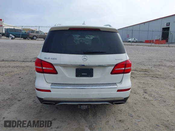 2018 Mercedes-Benz GLS with VIN 4JGDF6EE9JB077331, listed as a IAAI auction lot 41795143 with 99,148 mi miles. Bid and sale history available at carsss.com. Image 16.