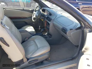 1999 Chrysler Sebring Jxi with VIN 3C3EL55H6XT603058, listed as a IAAI auction lot 41774322 with 157,852 mi miles. Bid and sale history available at carsss.com. Image 5.