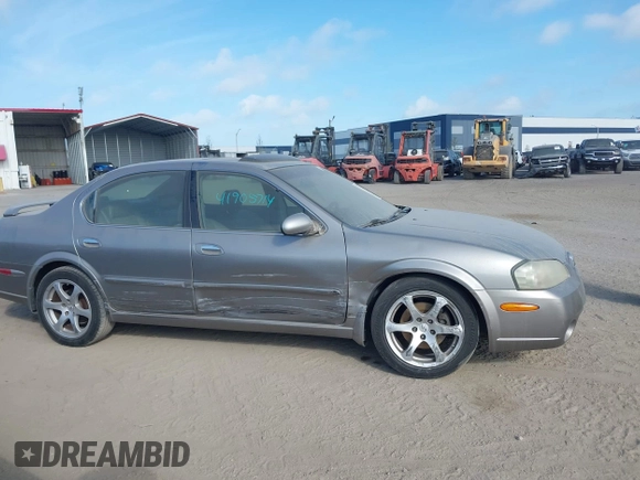 2003 Nissan Maxima GLE z VIN JN1DA31A83T411224, wystawiony jako IAAI lot #41905714 z przebiegiem Nie podano mil oraz . Historia ofert i sprzedaży dostępna na DreamBid. Obrazek 13.