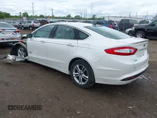 2016 Ford Fusion Titanium with VIN 3FA6P0SU5GR287017, listed as a IAAI auction lot 42316622 with 97,000 mi miles and . Bid and sale history available at DreamBid. Image 3.
