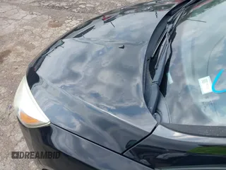 2016 Ford Focus SE z VIN 1FADP3F2XGL312445, wystawiony jako IAAI lot #42288210 z przebiegiem 64 115 mil mil oraz . Historia ofert i sprzedaży dostępna na DreamBid. Obrazek 6.
