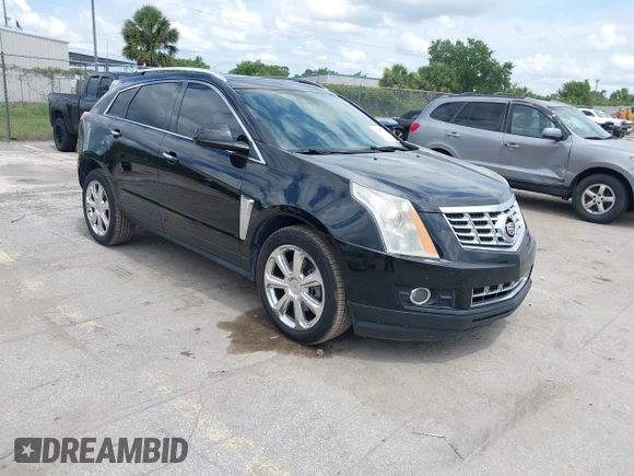 2015 Cadillac SRX Performance Collection z VIN 3GYFNCE31FS597798, wystawiony jako IAAI lot #42387793 z przebiegiem 159 986 mil mil oraz . Historia ofert i sprzedaży dostępna na DreamBid. Obrazek 1.