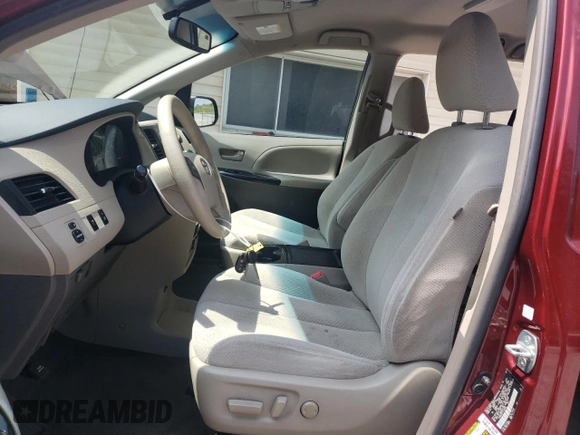 2012 Toyota Sienna LE AAS with VIN 5TDKK3DC4CS192002, listed as a Copart auction lot 61831895 with 173,293 mi miles and Salvage title. Bid and sale history available at DreamBid. Image 7.