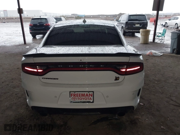 2023 Dodge Charger Scat Pack Widebody with VIN 2C3CDXGJ9PH516473, listed as a IAAI auction lot 41188167 with 38,021 mi miles and . Bid and sale history available at DreamBid. Image 16.