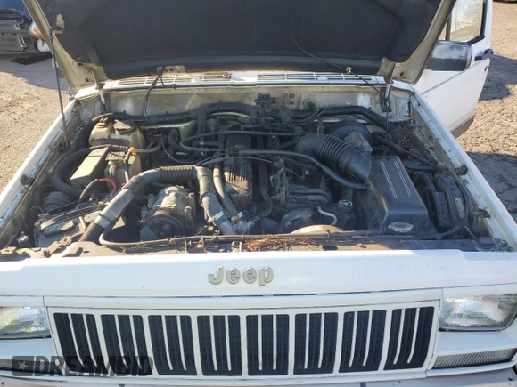 1993 Jeep Cherokee Country with VIN 1J4FJ78S0PL565292, listed as a Copart auction lot 83214974 with 233,925 mi miles and Clean Title. Bid and sale history available at carsss.com. Image 11.