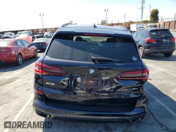 2023 BMW X5 xDrive45e with VIN 5UXTA6C06P9R89208, listed as a Copart auction lot 50352635 with 0 mi miles and Salvage Title. Bid and sale history available at carsss.com. Image 6.