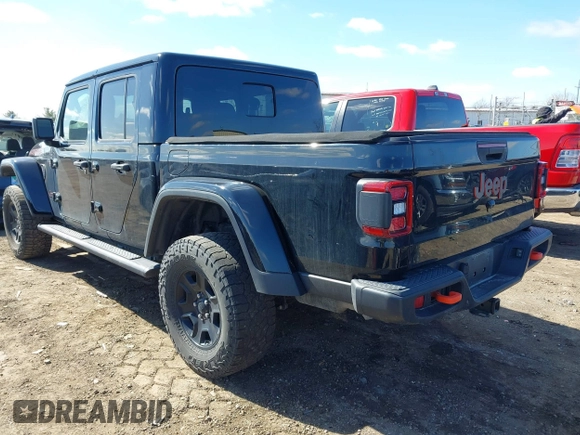 2021 Jeep Gladiator Mojave with VIN 1C6JJTEG9ML528964, listed as a IAAI auction lot 41879113 with 74,315 mi miles and . Bid and sale history available at DreamBid. Image 3.
