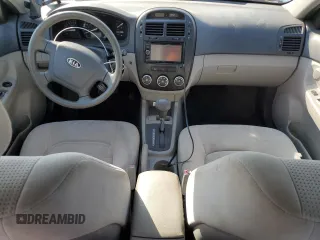 2009 Kia Spectra EX with VIN KNAFE221295654167, listed as a Copart auction lot 53377745 with 131,266 mi miles and Salvage Title. Bid and sale history available at DreamBid. Image 8.