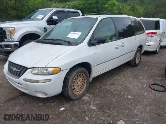 1998 Chrysler Town & Country LXi with VIN 1C4GP64L9WB664179, listed as a IAAI auction lot 42041600 with Not Provided miles. Bid and sale history available at carsss.com. Image 2.