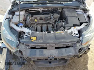 2014 Ford Focus Titanium with VIN 1FADP3J26EL132223, listed as a Copart auction lot 71490004 with 131,233 mi miles and Salvage Title. Bid and sale history available at DreamBid. Image 12.