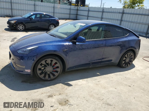 2022 Tesla Model Y Performance with VIN 7SAYGDEF4NF489629, listed as a Copart auction lot 64181775 with 22,120 mi miles and Salvage title. Bid and sale history available at DreamBid. Image 1.
