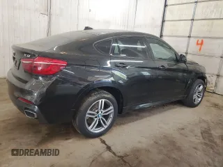 2017 BMW X6 xDrive35i z VIN 5UXKU2C54H0N84719, wystawiony jako Copart lot #55961065 z przebiegiem 56 452 mil mil oraz Szkoda całkowita • Salvage title. Historia ofert i sprzedaży dostępna na DreamBid. Obrazek 3.