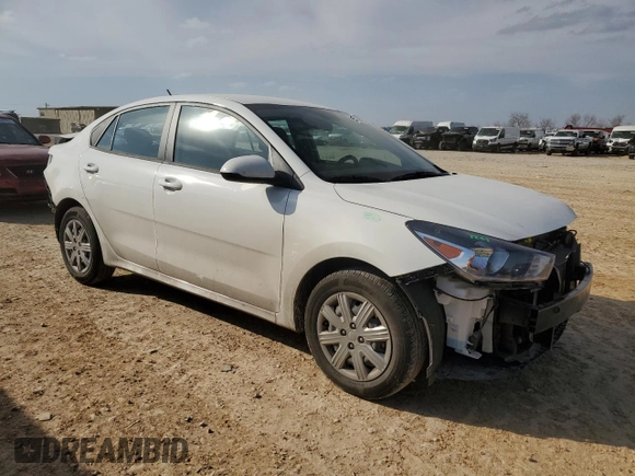 2023 Kia Rio S with VIN 3KPA24AD1PE615715, listed as a Copart auction lot 45717065 with 24,486 mi miles and Salvage Title. Bid and sale history available at carsss.com. Image 4.