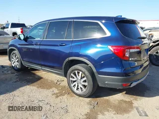 2021 Honda Pilot EX-L with VIN 5FNYF6H5XMB019411, listed as a IAAI auction lot 41756016 with 55,558 mi miles. Bid and sale history available at carsss.com. Image 3.