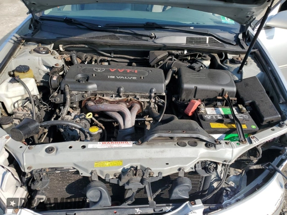 2005 Toyota Camry LE z VIN 4T1BE30K85U569235, wystawiony jako Copart lot #60223665 z przebiegiem 207 341 mil mil oraz Szkoda całkowita • Salvage title. Historia ofert i sprzedaży dostępna na DreamBid. Obrazek 11.