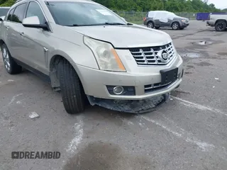 2014 Cadillac SRX Performance Collection z VIN 3GYFNCE35ES610504, wystawiony jako IAAI lot #42133548 z przebiegiem 140 306 mil mil oraz . Historia ofert i sprzedaży dostępna na DreamBid. Obrazek 6.