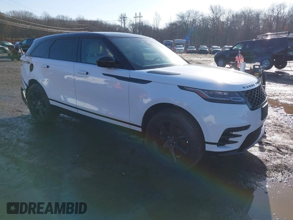2022 Land Rover Range Rover Velar R-Dynamic S z VIN SALYT2EX7NA341627, wystawiony jako IAAI lot #41111238 z przebiegiem 18 982 mil mil oraz . Historia ofert i sprzedaży dostępna na DreamBid. Obrazek 1.