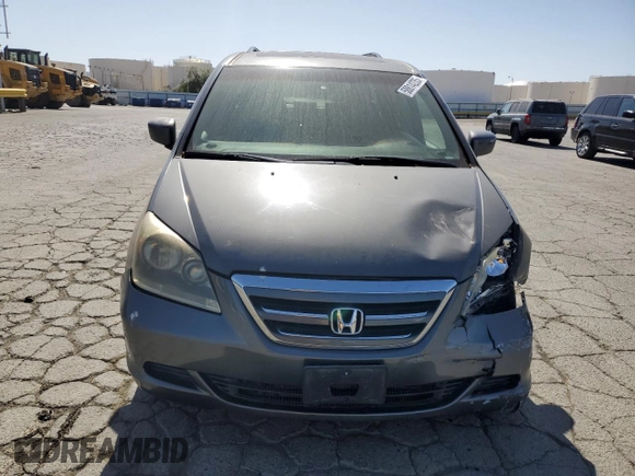 2007 Honda Odyssey EX-L z VIN 5FNRL38677B424117, wystawiony jako Copart lot #58814235 z przebiegiem 188 908 mil mil oraz Szkoda całkowita • Salvage title. Historia ofert i sprzedaży dostępna na DreamBid. Obrazek 5.