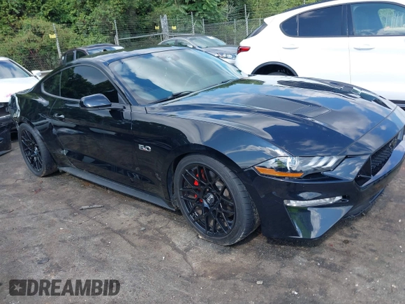 2021 Ford Mustang GT with VIN 1FA6P8CF0M5149169, listed as a IAAI auction lot 40151328 with 22,295 mi miles. Bid and sale history available at carsss.com. Image 1.
