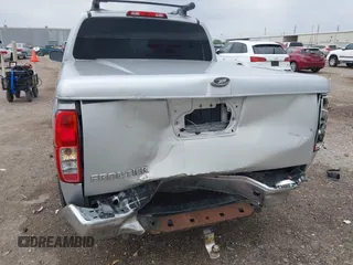 2005 Nissan Frontier LE with VIN 1N6AD07U25C457977, listed as a IAAI auction lot 41906592 with 256,116 mi miles and . Bid and sale history available at DreamBid. Image 6.