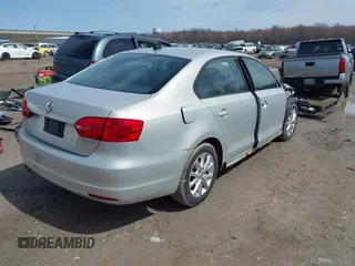 2011 Volkswagen Jetta Sedan SE w/Convenience & Sunroof PZEV with VIN 3VWDZ7AJXBM327932, listed as a IAAI auction lot 41950996 with 249,763 mi miles. Bid and sale history available at carsss.com. Image 4.