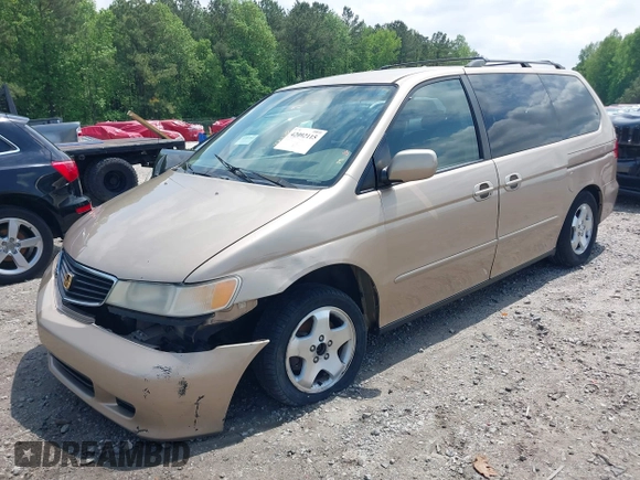 2000 Honda Odyssey EX with VIN 2HKRL1868YH513587, listed as a IAAI auction lot 42092115 with 302,555 mi miles and . Bid and sale history available at DreamBid. Image 17.