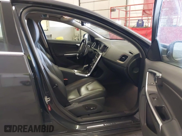 2015 Volvo S60 T5 Drive-E Premier Plus with VIN YV126MFC6F1313759, listed as a IAAI auction lot 41748305 with 43,491 mi miles and . Bid and sale history available at DreamBid. Image 5.