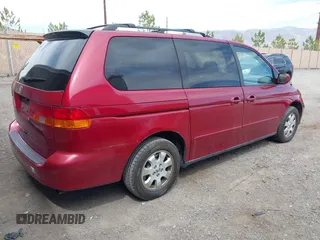 2003 Honda Odyssey EX with VIN 5FNRL18643B086576, listed as a IAAI auction lot 41991328 with 130,025 mi miles and . Bid and sale history available at carsss.com. Image 4.