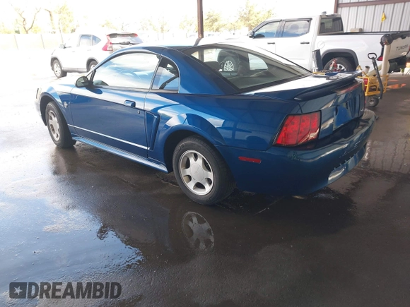 1999 Ford Mustang with VIN 1FAFP4040XF124637, listed as a IAAI auction lot 41793662 with 54,591 mi miles and . Bid and sale history available at DreamBid. Image 3.