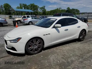 2014 Maserati Ghibli S Q4 z VIN ZAM57RTA0E1083758, wystawiony jako Copart lot #55627695 z przebiegiem 102 316 mil mil oraz Szkody całkowita. Historia ofert i sprzedaży dostępna na DreamBid. Obrazek 1.