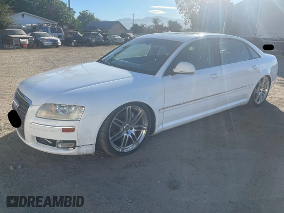 2009 Audi A8 4.2L with VIN WAUMV94E19N002897, listed as a Copart auction lot 64525445 with 140,526 mi miles and Clean title. Bid and sale history available at DreamBid. Image 2.
