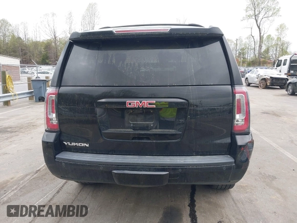 2017 GMC Yukon SLT with VIN 1GKS1BKC2HR128308, listed as a IAAI auction lot 41945770 with 158,905 mi miles. Bid and sale history available at carsss.com. Image 16.