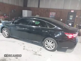 2014 Toyota Avalon Limited with VIN 4T1BK1EB0EU114093, listed as a IAAI auction lot 41311332 with 103,479 mi miles and . Bid and sale history available at DreamBid. Image 3.